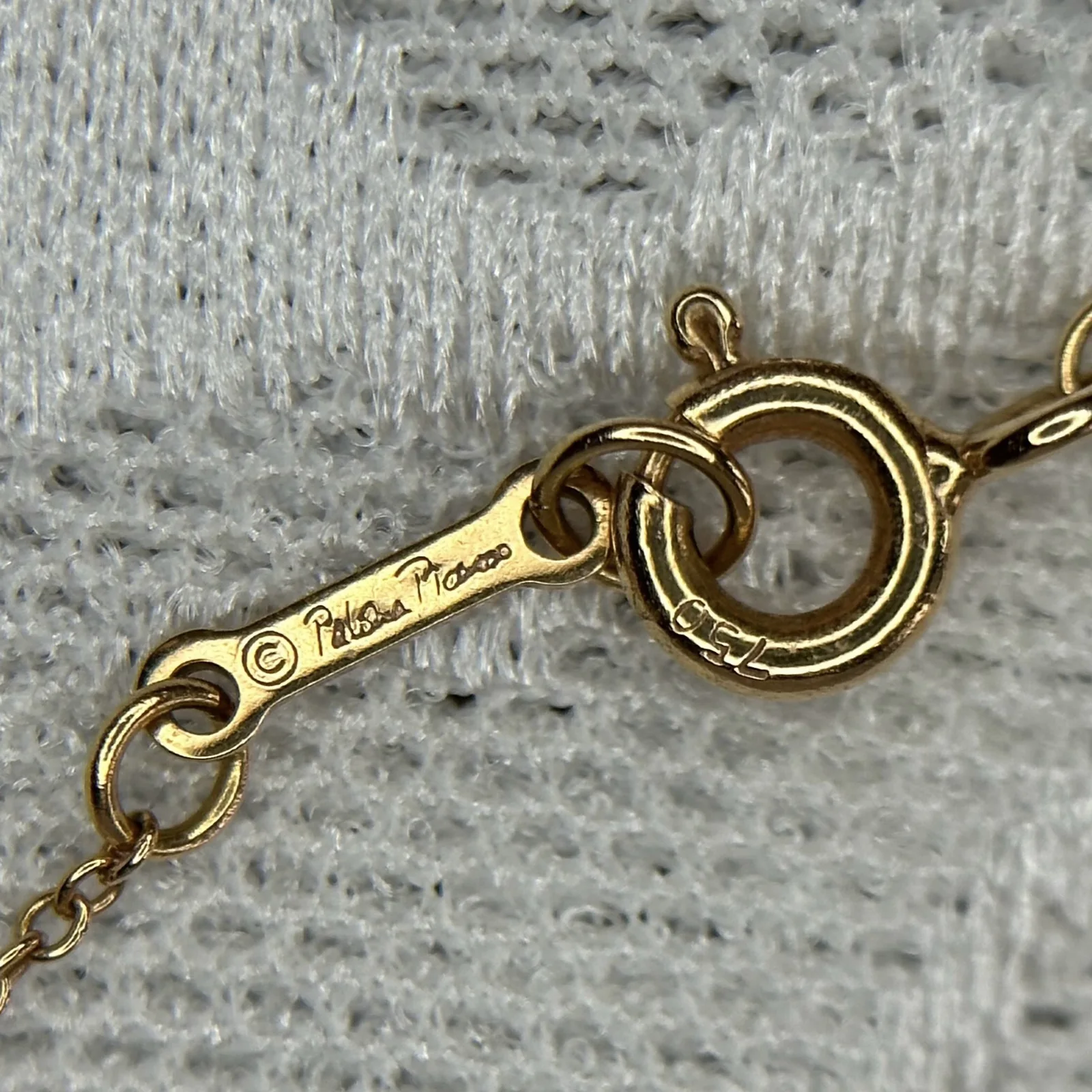 Tiffany & Co. Hallmark Checker — Designer signature